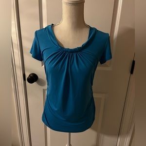 Women’s size small short sleeve blouse.